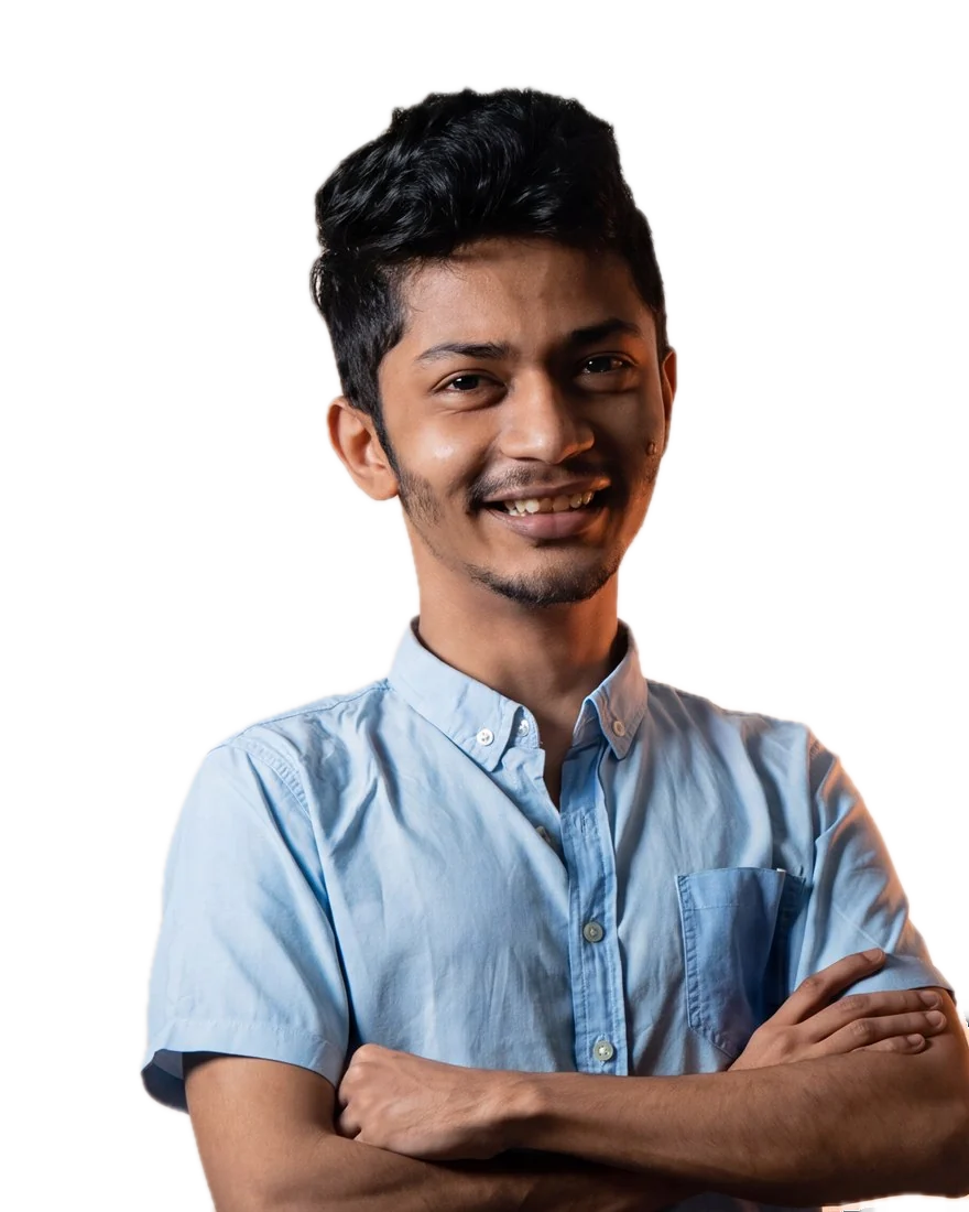 Ryan Nugara, smiling, arms crossed, in a light blue shirt